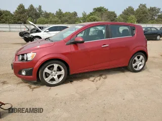 2012 Chevrolet Sonic LTZ z VIN 1G1JE6SH7C4111176, wystawiony jako Copart lot #59002575 z przebiegiem 116 640 mil mil oraz Szkoda całkowita • Salvage title. Historia ofert i sprzedaży dostępna na DreamBid. Obrazek 1.