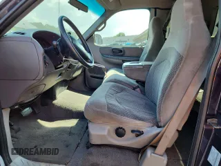 1999 Ford F-150 with VIN 1FTZX1729XNB58298, listed as a Copart auction lot 62369755 with 165,150 mi miles and Clean title. Bid and sale history available at DreamBid. Image 7.