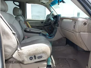 2002 GMC Yukon Denali z VIN 1GKEK63UX2J216442, wystawiony jako IAAI lot #42391575 z przebiegiem 122 668 mil mil oraz . Historia ofert i sprzedaży dostępna na DreamBid. Obrazek 5.