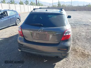 2009 Toyota Matrix S z VIN 2T1LE40E09C006482, wystawiony jako IAAI lot #42624578 z przebiegiem 163 224 mil mil oraz . Historia ofert i sprzedaży dostępna na DreamBid. Obrazek 16.