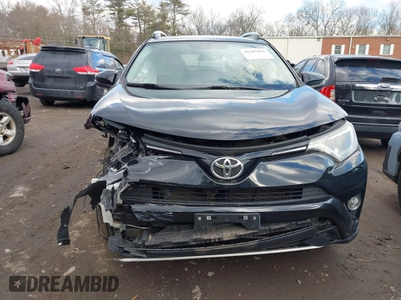 2016 Toyota RAV4 XLE with VIN 2T3RFREV4GW416606, listed as a IAAI auction lot 41387652 with 93,977 mi miles and . Bid and sale history available at DreamBid. Image 13.