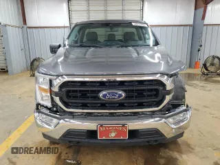 2021 Ford F-150 XL with VIN 1FTMF1EP7MKE58611, listed as a Copart auction lot 56912955 with 30,850 mi miles and Salvage title. Bid and sale history available at DreamBid. Image 5.