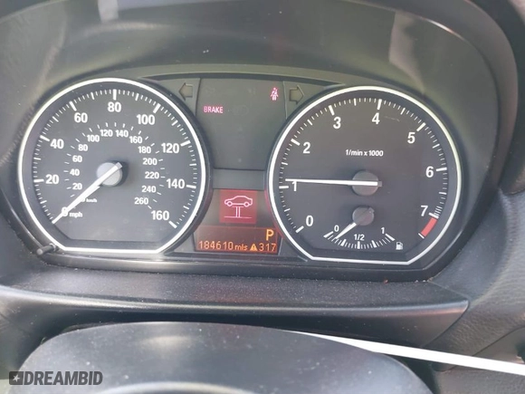2011 BMW 1 Series 128i with VIN WBAUP9C53BVL89535, listed as a IAAI auction lot 41619966 with 184,610 mi miles. Bid and sale history available at carsss.com. Image 7.