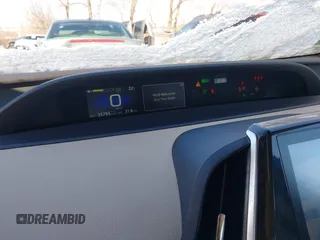 2021 Toyota Prius L Eco with VIN JTDKAMFU9M3135117, listed as a IAAI auction lot 41579736 with 35,795 mi miles and . Bid and sale history available at DreamBid. Image 7.