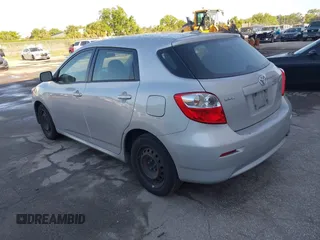 2009 Toyota Matrix with VIN 2T1KU40E59C106253, listed as a IAAI auction lot 41974823 with 126,155 mi miles. Bid and sale history available at carsss.com. Image 3.