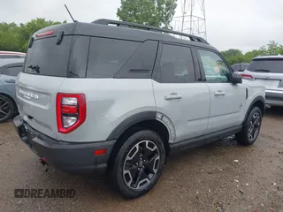 2023 Ford Bronco Sport Outer Banks z VIN 3FMCR9C61PRD19727, wystawiony jako IAAI lot #42315280 z przebiegiem 69 985 mil mil oraz . Historia ofert i sprzedaży dostępna na DreamBid. Obrazek 4.