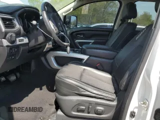 2017 Nissan Titan SV with VIN 1N6AA1E53HN570453, listed as a Copart auction lot 52941025 with 146,705 mi miles and Salvage title. Bid and sale history available at DreamBid. Image 7.