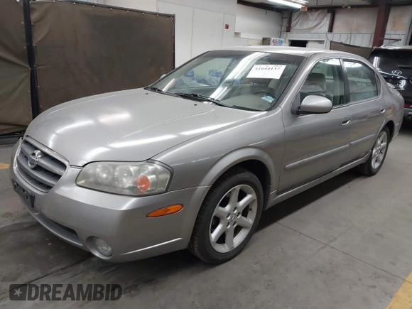 2002 Nissan Maxima GLE with VIN JN1DA31D32T422365, listed as a IAAI auction lot 41644137 with 165,157 mi miles and . Bid and sale history available at DreamBid. Image 17.
