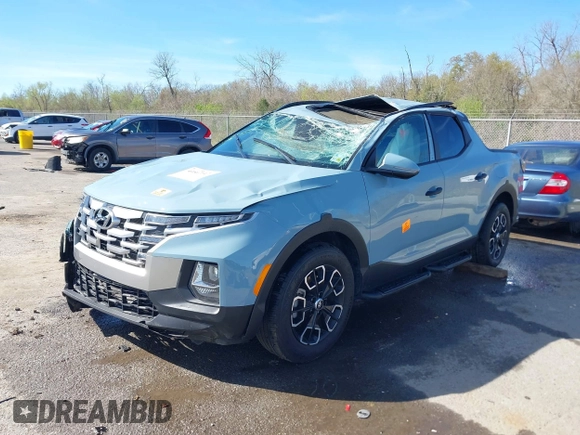 2023 Hyundai Santa Cruz SEL z VIN 5NTJC4AE4PH042943, wystawiony jako IAAI lot #41807647 z przebiegiem Nie podano mil oraz . Historia ofert i sprzedaży dostępna na DreamBid. Obrazek 2.