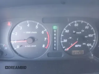 2002 Isuzu Rodeo S with VIN 4S2DM58W824313096, listed as a Copart auction lot 77951364 with 127,470 mi miles and Salvage Title. Bid and sale history available at DreamBid. Image 9.