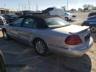 2001 Lincoln Continental with VIN 1LNHM97V31Y641106, listed as a Copart auction lot 77468194 with 86,363 mi miles and Clean Title. Bid and sale history available at carsss.com. Image 2.