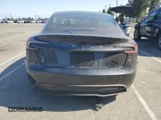 2025 Tesla Model 3 Long Range with VIN 5YJ3E1EA8SF896333, listed as a Copart auction lot 61876445 with 5,690 mi miles and Salvage title. Bid and sale history available at DreamBid. Image 6.