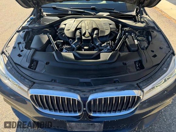 2016 BMW 7 Series 750i with VIN WBA7F0C53GGM20435, listed as a Copart auction lot 77656554 with 186,227 mi miles and Clean Title. Bid and sale history available at carsss.com. Image 7.