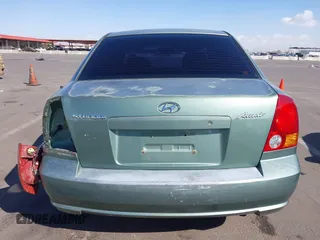 2005 Hyundai Accent GLS with VIN KMHCG45C95U620716, listed as a IAAI auction lot 41740573 with 187,971 mi miles. Bid and sale history available at carsss.com. Image 17.