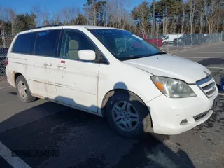 2007 Honda Odyssey EX with VIN 5FNRL38417B055298, listed as a IAAI auction lot 39332584 with 232,760 mi miles. Bid and sale history available at carsss.com. Image 1.