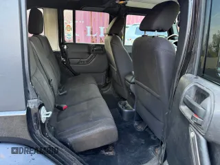 2015 Jeep Wrangler Unlimited Sport with VIN 1C4BJWDG8FL502570, listed as a Copart auction lot 65854505 with 120,541 mi miles and Clean title. Bid and sale history available at DreamBid. Image 6.