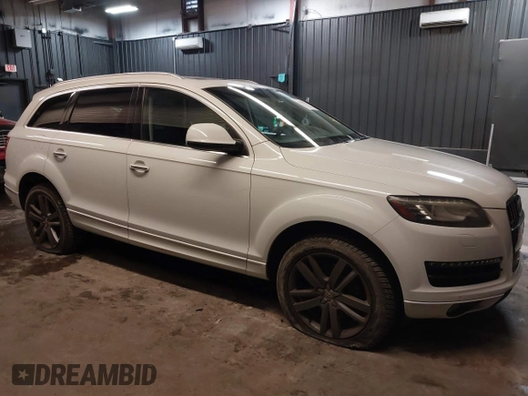 2013 Audi Q7 Premium Plus with VIN WA1LGAFE1DD009705, listed as a IAAI auction lot 41390712 with 99,649 mi miles and . Bid and sale history available at DreamBid. Image 1.