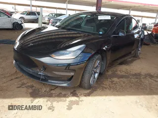 2022 Tesla Model 3 Long Range with VIN 5YJ3E1EB3NF257077, listed as a IAAI auction lot 42086629 with Not Provided miles and . Bid and sale history available at DreamBid. Image 2.