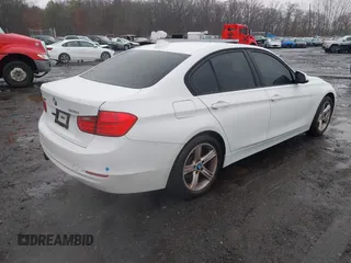 2013 BMW 3 Series 328i xDrive with VIN WBA3B3G50DNR81124, listed as a IAAI auction lot 41087933 with 133,660 mi miles and . Bid and sale history available at DreamBid. Image 4.