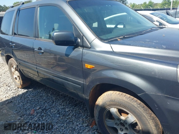 2006 Honda Pilot EX-L with VIN 2HKYF187X6H557468, listed as a IAAI auction lot 42017101 with 213,425 mi miles and . Bid and sale history available at carsss.com. Image 6.