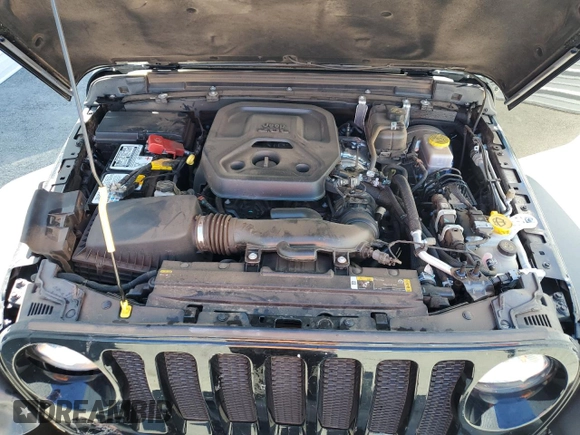 2023 Jeep Wrangler Sport with VIN 1C4HJXDNXPW701795, listed as a Copart auction lot 50451444 with 7,274 mi miles and Salvage Title. Bid and sale history available at DreamBid. Image 11.