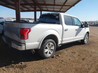 2015 Ford F-150 XLT with VIN 1FTEW1EFXFFA89038, listed as a IAAI auction lot 41365907 with 216,785 mi miles. Bid and sale history available at carsss.com. Image 4.