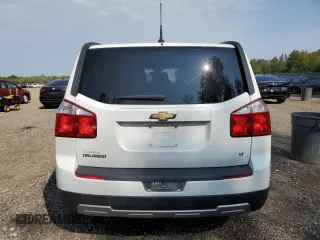 2012 Chevrolet Orlando 1LT z VIN KL77P2EM6CK569152, wystawiony jako Copart lot #69464984 z przebiegiem 70 194 mil mil oraz Tytuł czysty. Historia ofert i sprzedaży dostępna na DreamBid. Obrazek 6.