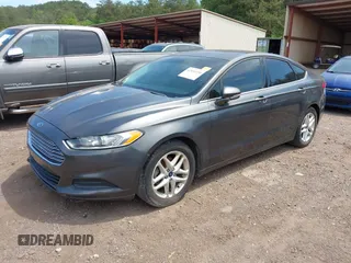 2016 Ford Fusion SE with VIN 3FA6P0H7XGR319039, listed as a IAAI auction lot 42051350 with 107,301 mi miles. Bid and sale history available at carsss.com. Image 2.