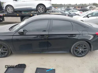 2024 Honda Civic Sport with VIN 2HGFE2F51RH594148, listed as a IAAI auction lot 41304184 with 11,307 mi miles and . Bid and sale history available at DreamBid. Image 14.