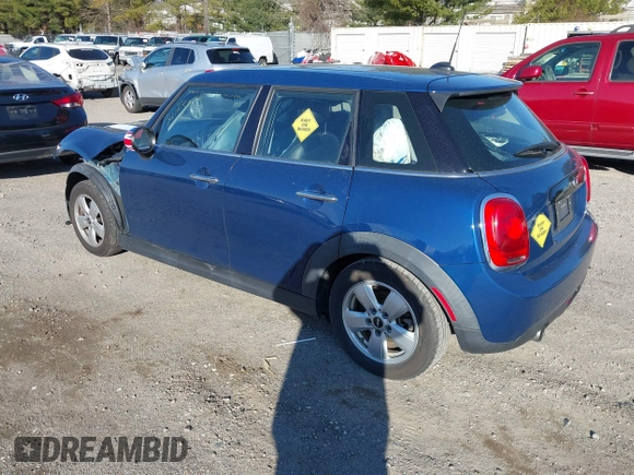 2016 MINI Hardtop 4 Door z VIN WMWXU1C54G2D09582, wystawiony jako IAAI lot #41754947 z przebiegiem 113 405 mil mil oraz . Historia ofert i sprzedaży dostępna na DreamBid. Obrazek 3.