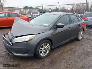 2018 Ford Focus SE with VIN 1FADP3F23JL298265, listed as a IAAI auction lot 42005754 with 134,721 mi miles. Bid and sale history available at carsss.com. Image 2.