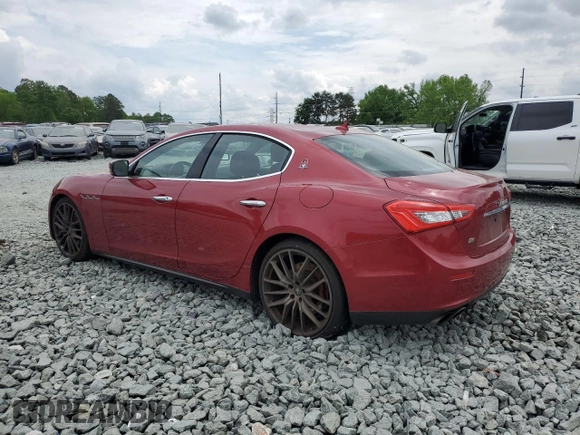 2014 Maserati Ghibli S Q4 with VIN ZAM57RTA7E1128937, listed as a Copart auction lot 54492205 with 79,897 mi miles and Salvage title. Bid and sale history available at DreamBid. Image 2.