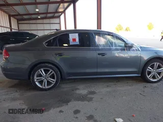 2014 Volkswagen Passat SE z VIN 1VWBN7A32EC059503, wystawiony jako IAAI lot #40876045 z przebiegiem Nie podano mil oraz . Historia ofert i sprzedaży dostępna na DreamBid. Obrazek 8.