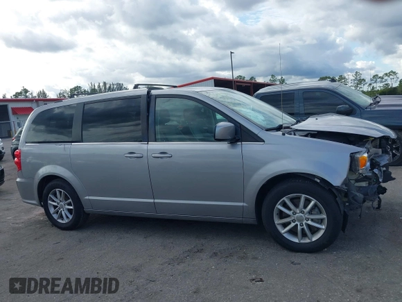2018 Dodge Grand Caravan SXT z VIN 2C4RDGCG4JR179115, wystawiony jako IAAI lot #41163101 z przebiegiem 107 258 mil mil oraz . Historia ofert i sprzedaży dostępna na DreamBid. Obrazek 14.
