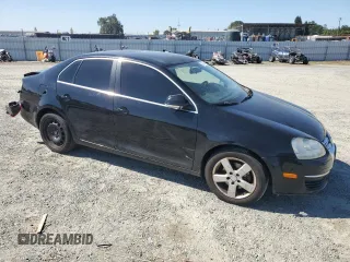 2009 Volkswagen Jetta SE with VIN 3VWRZ71K39M139505, listed as a Copart auction lot 57687645 with 217,149 mi miles and Salvage title. Bid and sale history available at DreamBid. Image 4.