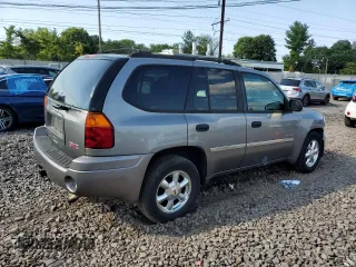 2006 GMC Envoy SLT with VIN 1GKDT13S962305588, listed as a Copart auction lot 69196964 with 118,289 mi miles and Salvage Title. Bid and sale history available at DreamBid. Image 3.