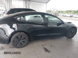 2024 Tesla Model 3 with VIN 5YJ3E1EA6RF731312, listed as a IAAI auction lot 41987407 with 5,025 mi miles and . Bid and sale history available at DreamBid. Image 13.