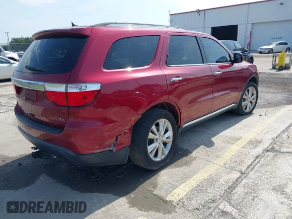 2013 Dodge Durango Crew z VIN 1C4RDJDG6DC672934, wystawiony jako IAAI lot #42542073 z przebiegiem 181 812 mil mil oraz . Historia ofert i sprzedaży dostępna na DreamBid. Obrazek 4.