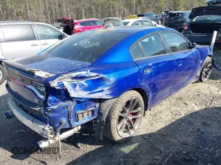 2020 Dodge Charger Scat Pack z VIN 2C3CDXGJ4LH157432, wystawiony jako IAAI lot #41872478 z przebiegiem 65 640 mil mil oraz . Historia ofert i sprzedaży dostępna na DreamBid. Obrazek 4.