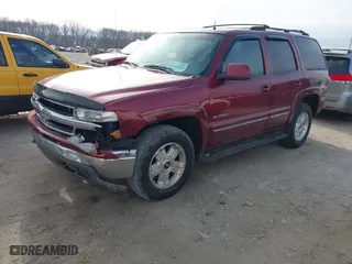 2002 Chevrolet Tahoe LT with VIN 1GNEK13Z42J169278, listed as a IAAI auction lot 41743076 with 227,870 mi miles. Bid and sale history available at carsss.com. Image 2.