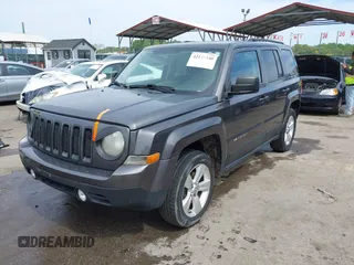 2014 Jeep Patriot Latitude with VIN 1C4NJRFB3ED847997, listed as a IAAI auction lot 42109140 with 121,299 mi miles and . Bid and sale history available at carsss.com. Image 17.