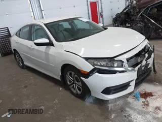 2017 Honda Civic LX z VIN 19XFC2F5XHE007668, wystawiony jako IAAI lot #42219927 z przebiegiem 132 444 mil mil oraz . Historia ofert i sprzedaży dostępna na DreamBid. Obrazek 1.