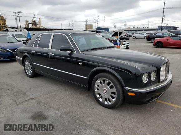 2005 Bentley Arnage R with VIN SCBLC37F95CX10586, listed as a Copart auction lot 55852485 with 38,584 mi miles and Salvage Title. Bid and sale history available at DreamBid. Image 4.