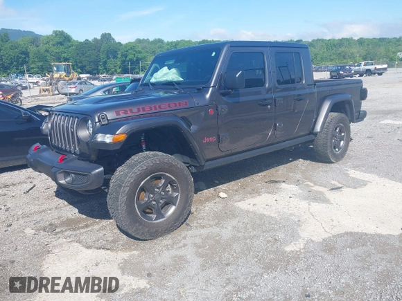 2021 Jeep Gladiator Rubicon z VIN 1C6JJTBG9ML592538, wystawiony jako IAAI lot #42206035 z przebiegiem 37 945 mil mil oraz . Historia ofert i sprzedaży dostępna na DreamBid. Obrazek 17.