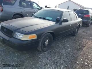 2006 Ford Police Interceptor with VIN 2FAHP71W76X142677, listed as a IAAI auction lot 41173196 with 152,236 mi miles. Bid and sale history available at carsss.com. Image 2.