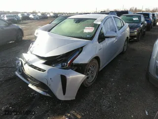 2022 Toyota Prius L Eco with VIN JTDKAMFU5N3156063, listed as a IAAI auction lot 41214358 with 208,666 mi miles. Bid and sale history available at carsss.com. Image 2.