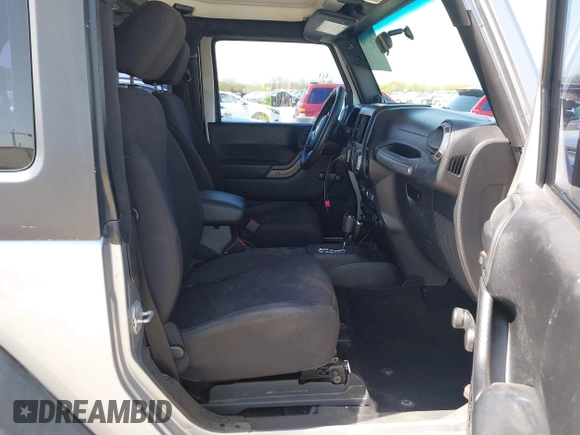 2014 Jeep Wrangler Sport with VIN 1C4AJWAG9EL155409, listed as a IAAI auction lot 41869906 with 102,400 mi miles and . Bid and sale history available at carsss.com. Image 5.