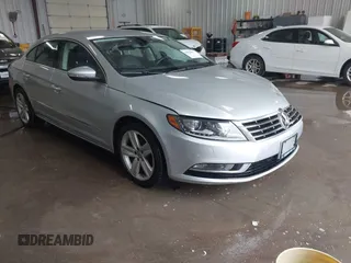 2015 Volkswagen CC R-Line with VIN WVWBP7AN9FE826400, listed as a IAAI auction lot 40931896 with 117,022 mi miles and . Bid and sale history available at DreamBid. Image 1.