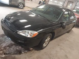 2004 Ford Taurus SE z VIN 1FAFP53U74G107504, wystawiony jako IAAI lot #42068692 z przebiegiem Nie podano mil oraz . Historia ofert i sprzedaży dostępna na DreamBid. Obrazek 2.