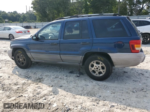 2001 Jeep Grand Cherokee Laredo with VIN 1J4GX48S11C729366, listed as a Copart auction lot 62524565 with 373,749 mi miles and Salvage title. Bid and sale history available at DreamBid. Image 2.